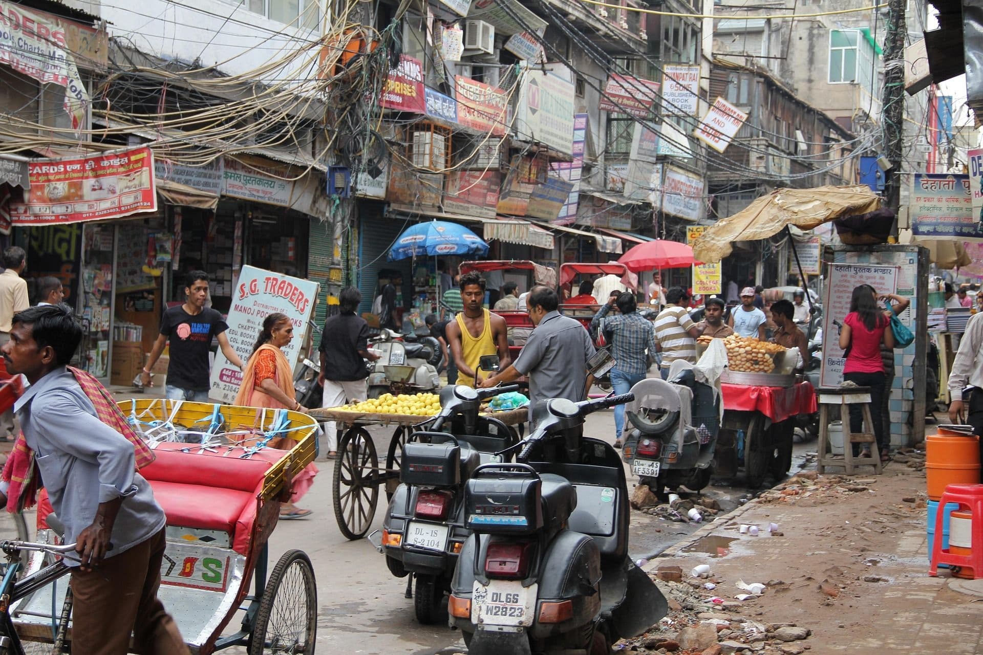 A road with people in Delhi.